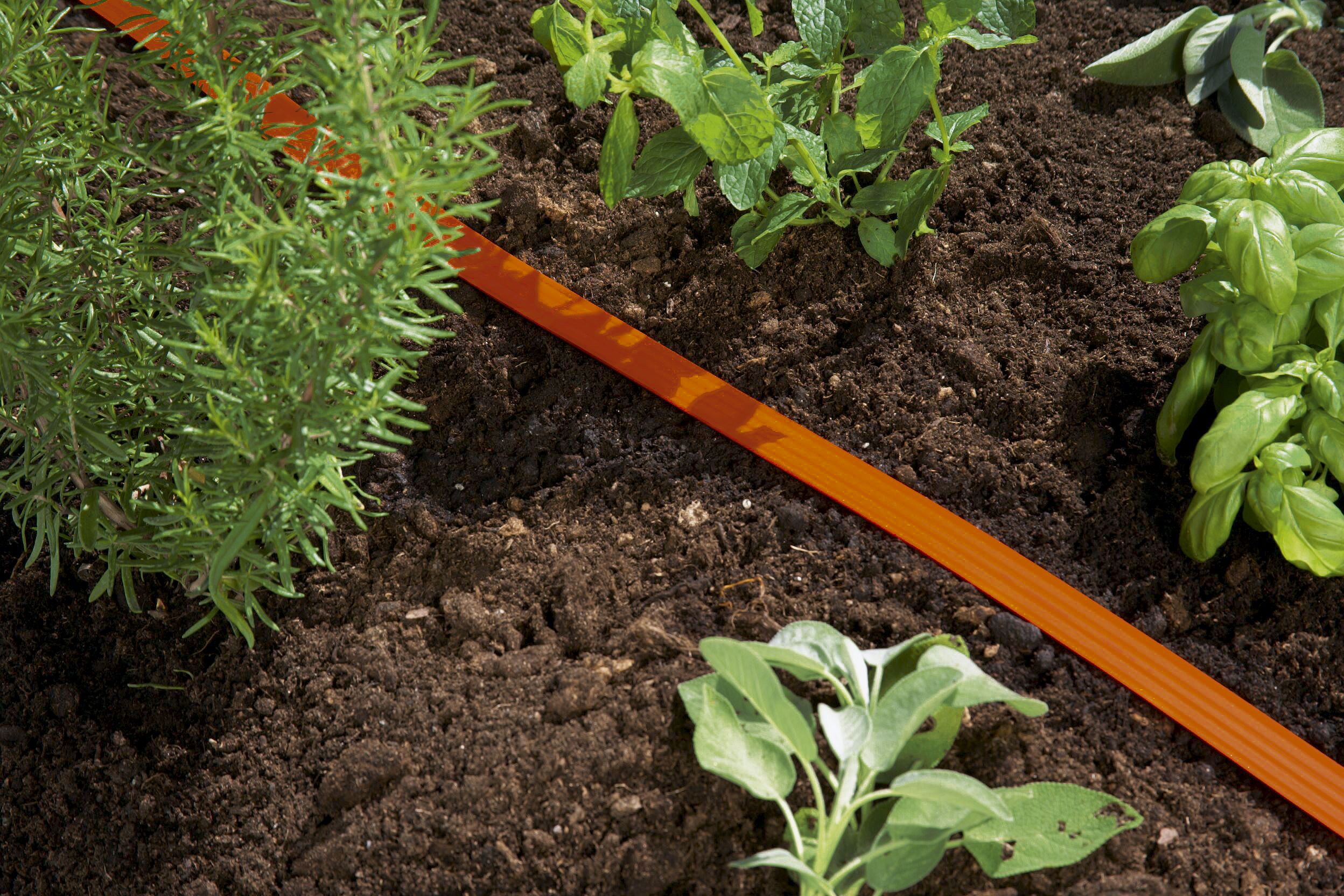 Manguera microperforada naranja de 7,5 m