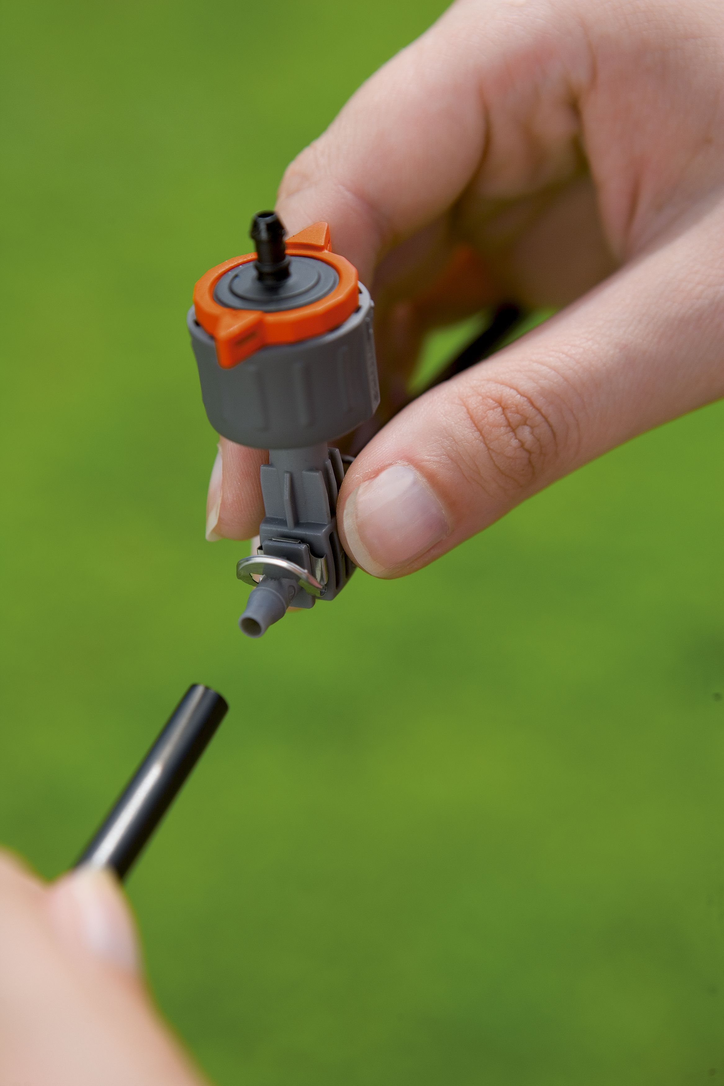 Gotero en línea ajustable regulador de presión