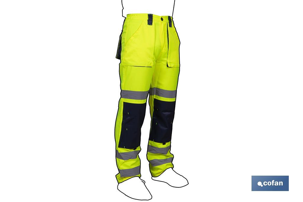 PANTALÓN DE ALTA VISIBILIDAD MODELO SIRIO AMARILLO Y AZUL MARINO TALLA M