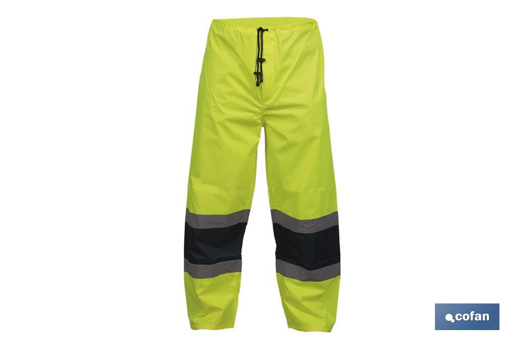 PANTALÓN DE LLUVIA DE ALTA VISIBILIDAD MODELO BELLATRIX AMARILLA Y AZUL TALLA XXL