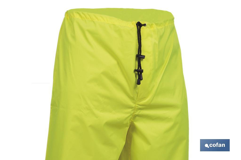 PANTALÓN DE LLUVIA DE ALTA VISIBILIDAD MODELO BELLATRIX AMARILLA Y AZUL TALLA XXL