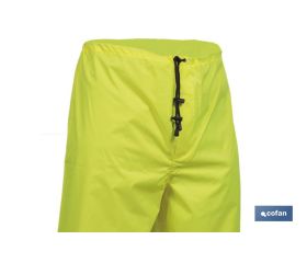 PANTALÓN DE LLUVIA DE ALTA VISIBILIDAD MODELO BELLATRIX AMARILLA Y AZUL TALLA XXL