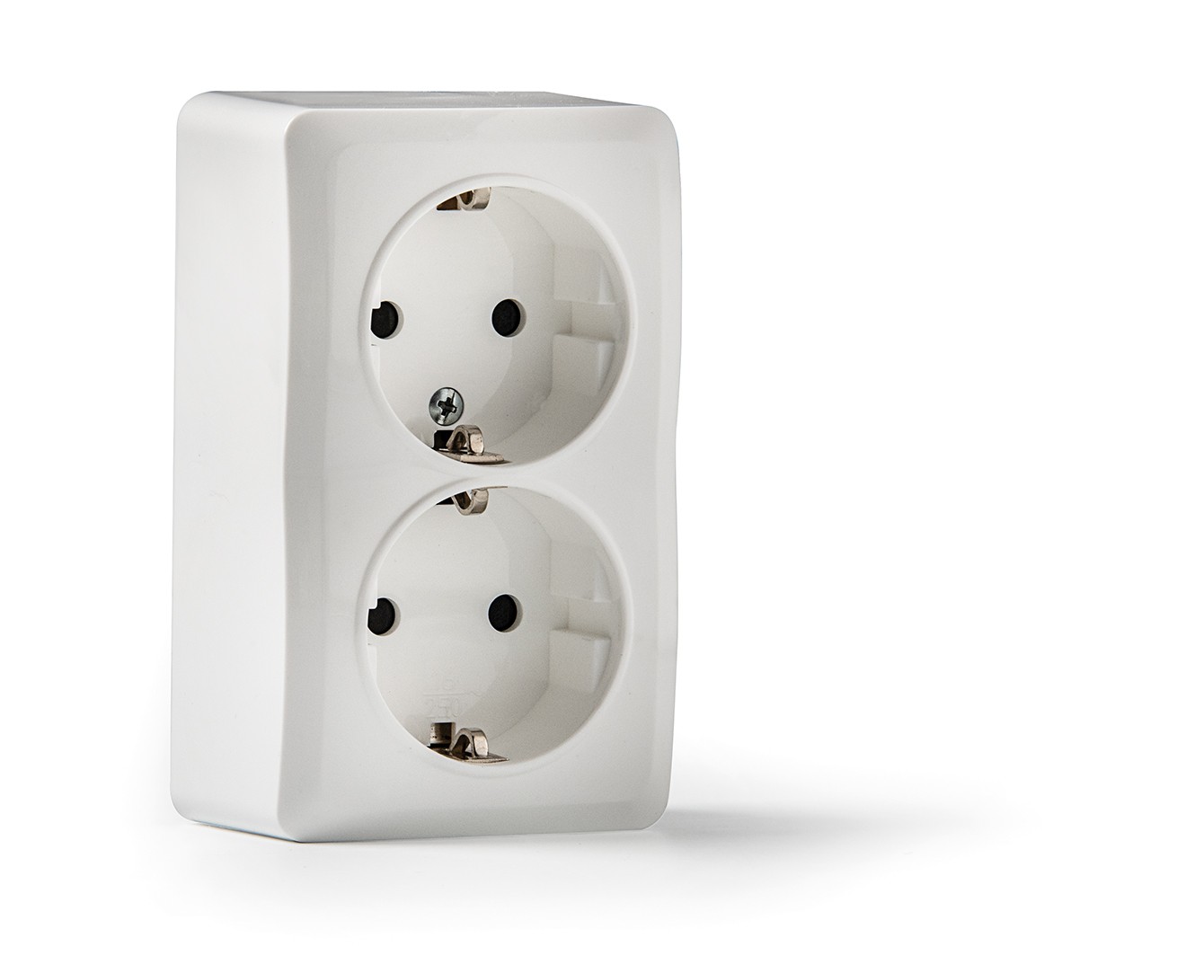 7025 | Doble base 16A con toma de tierra de superficie