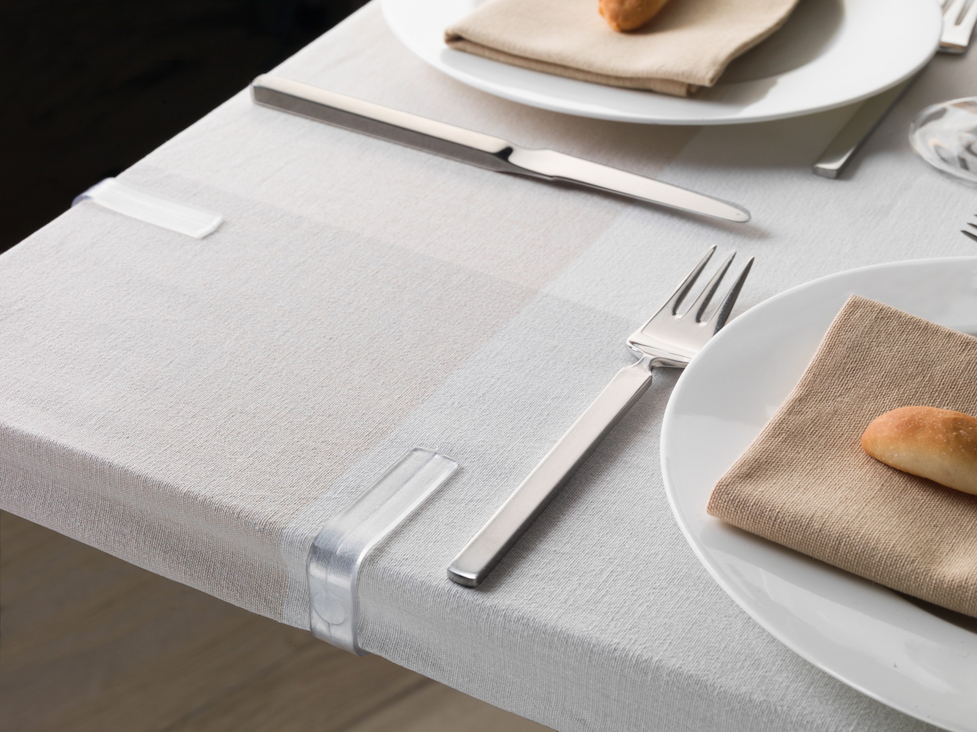 Pinza sujeta-mantel / transparente