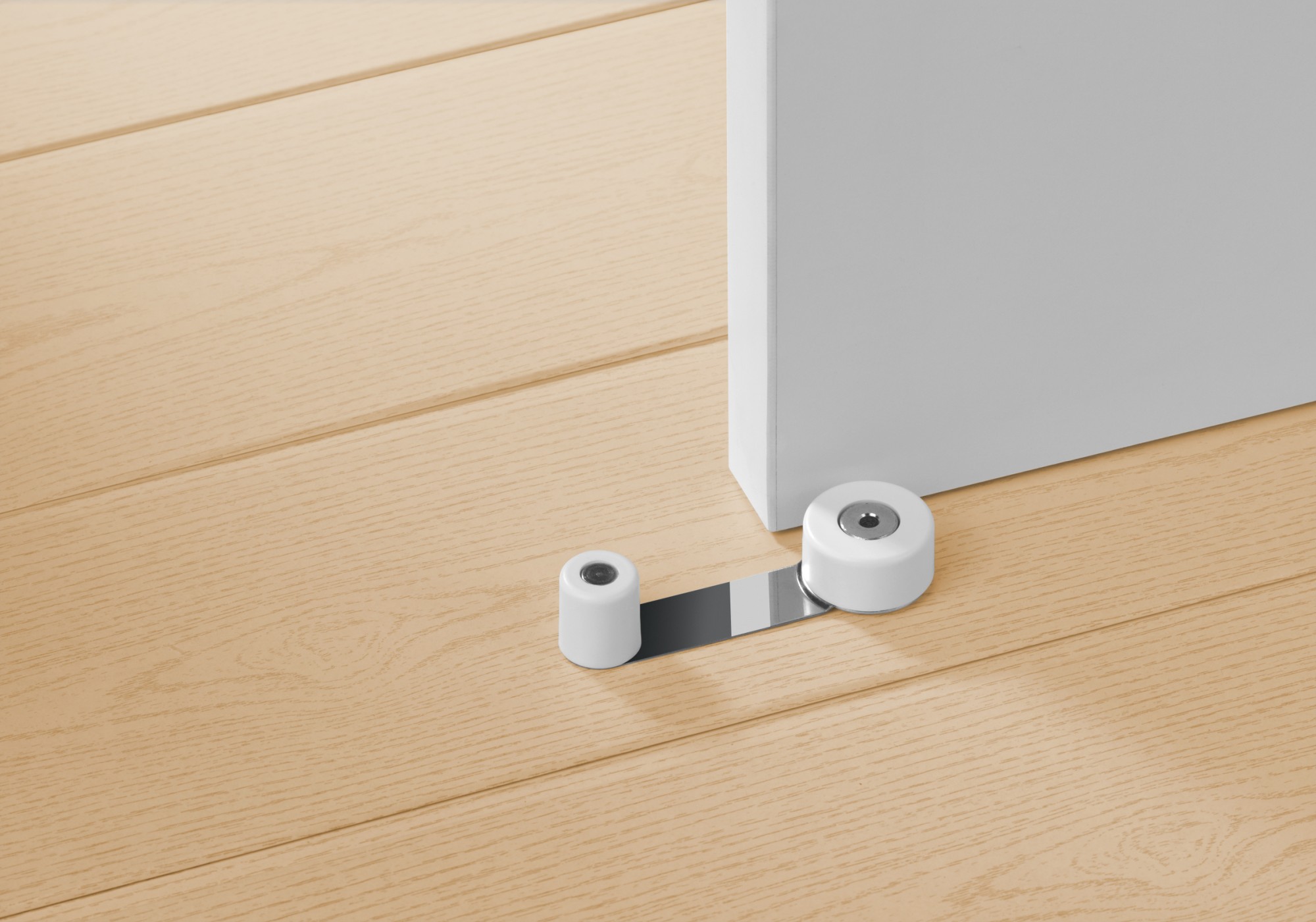 Tope retenedor giratorio metálico / blanco