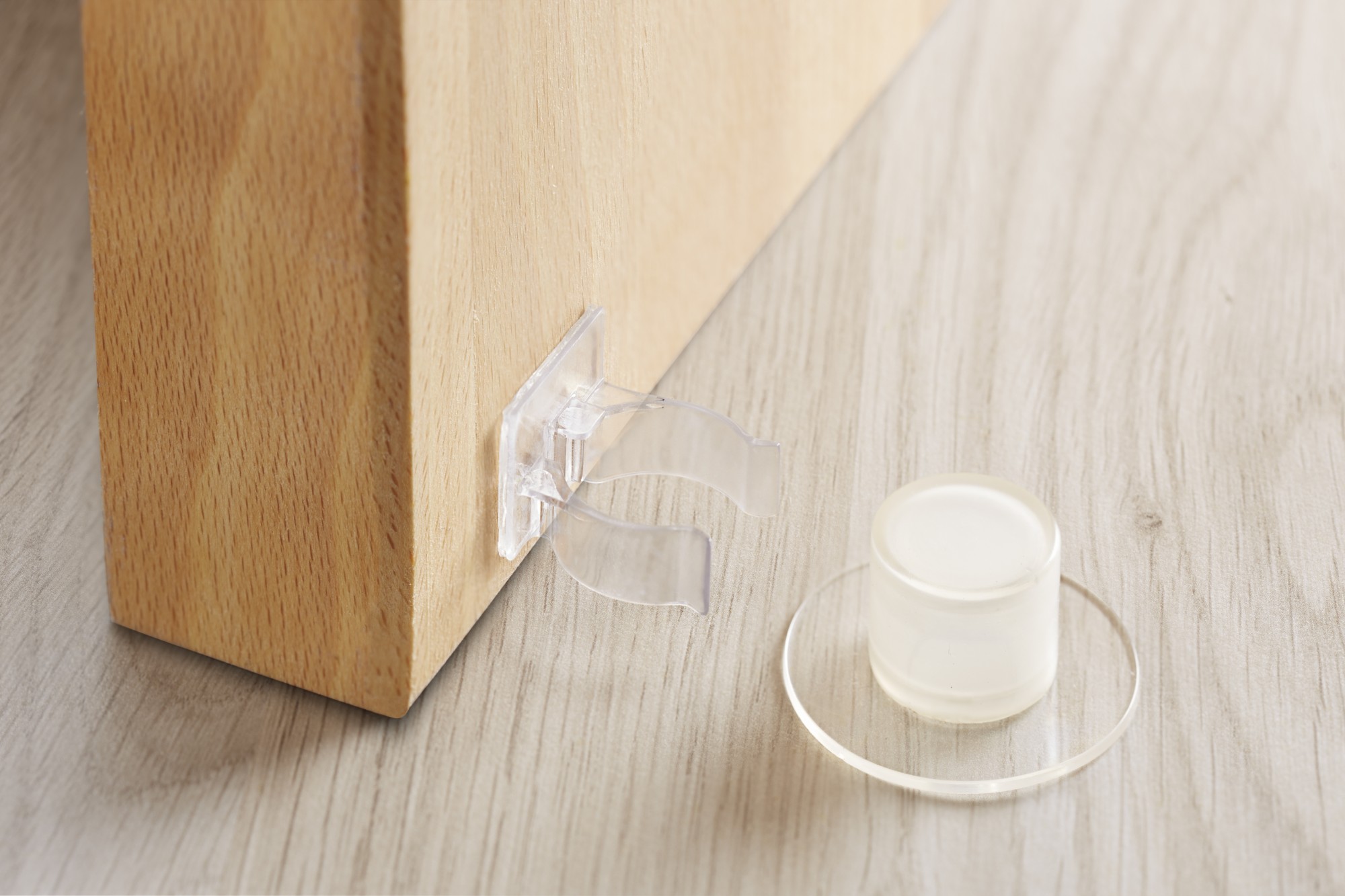 Tope y retenedor pinza adhesivos para puerta / transparente