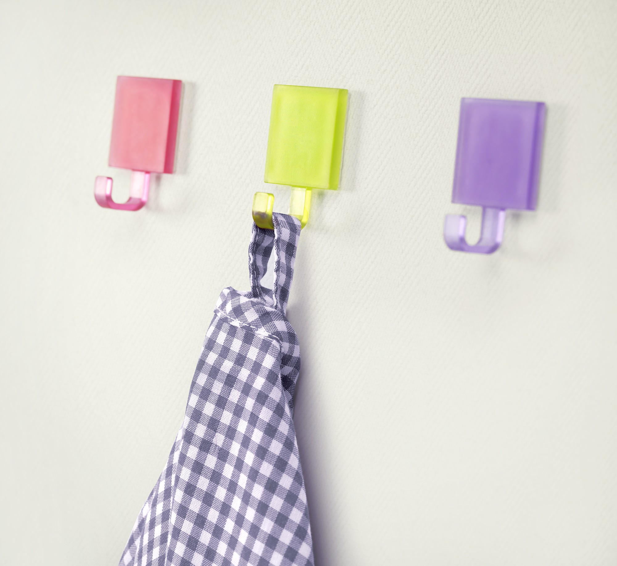 Colgador adhesivo semitransparente / surtido