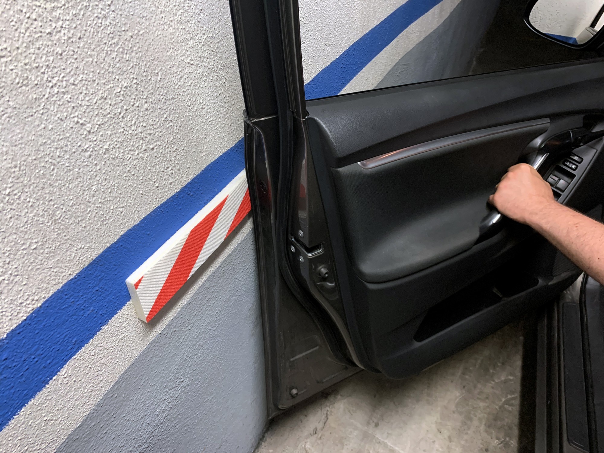 Protector parking lateral / rojo-blanco