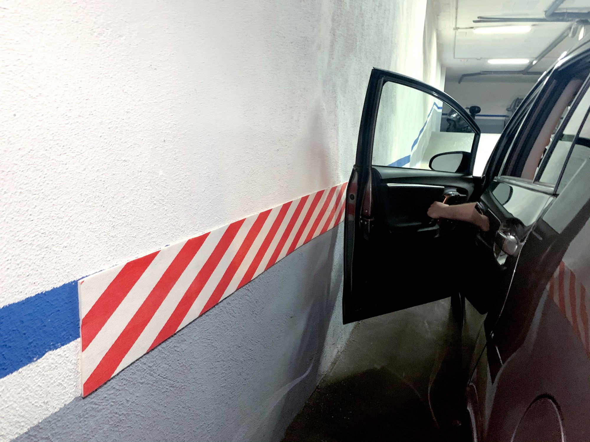 Protector parking en rollo 2m. / rojo-blanco