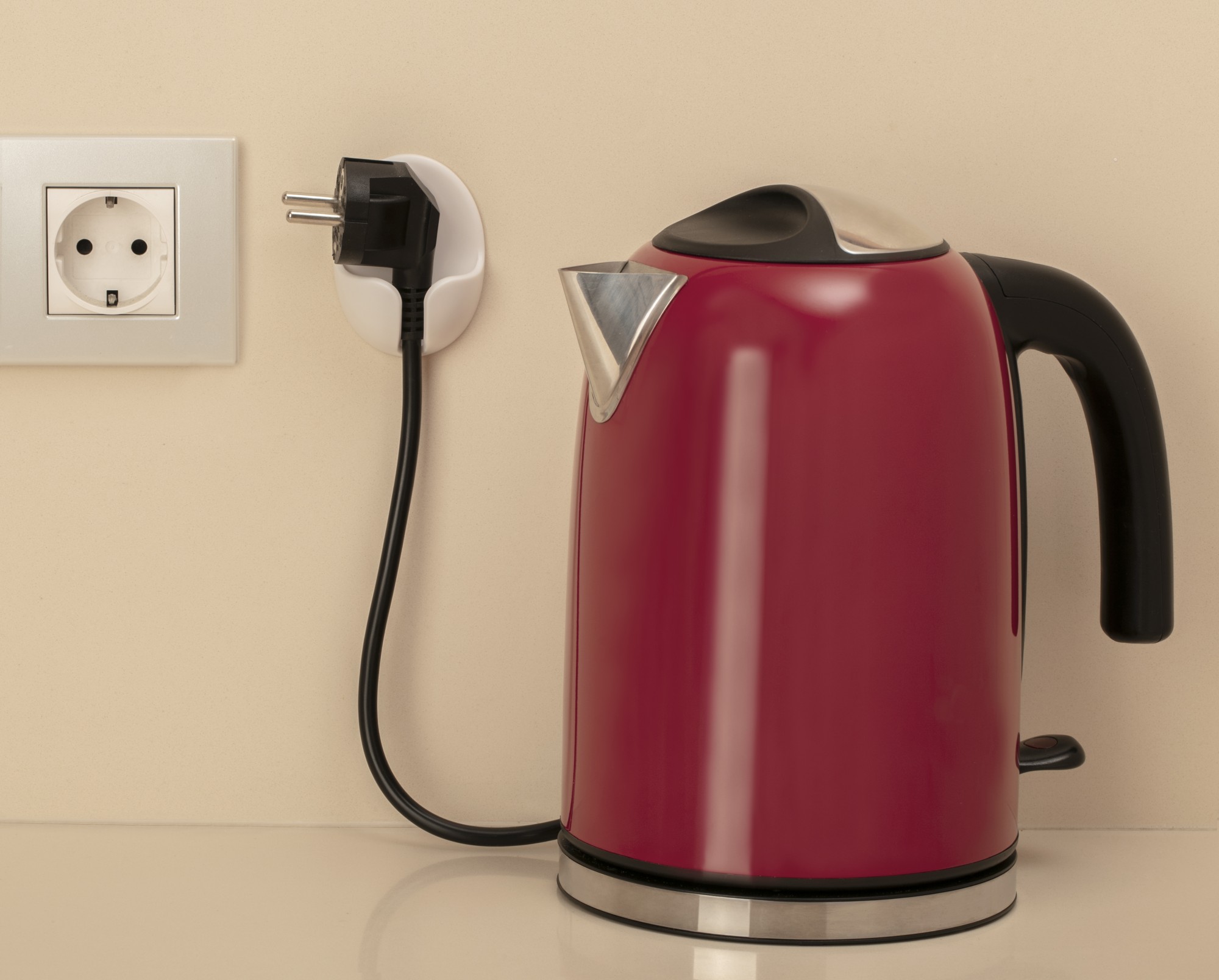 Soporte adhesivo para enchufe / blanco