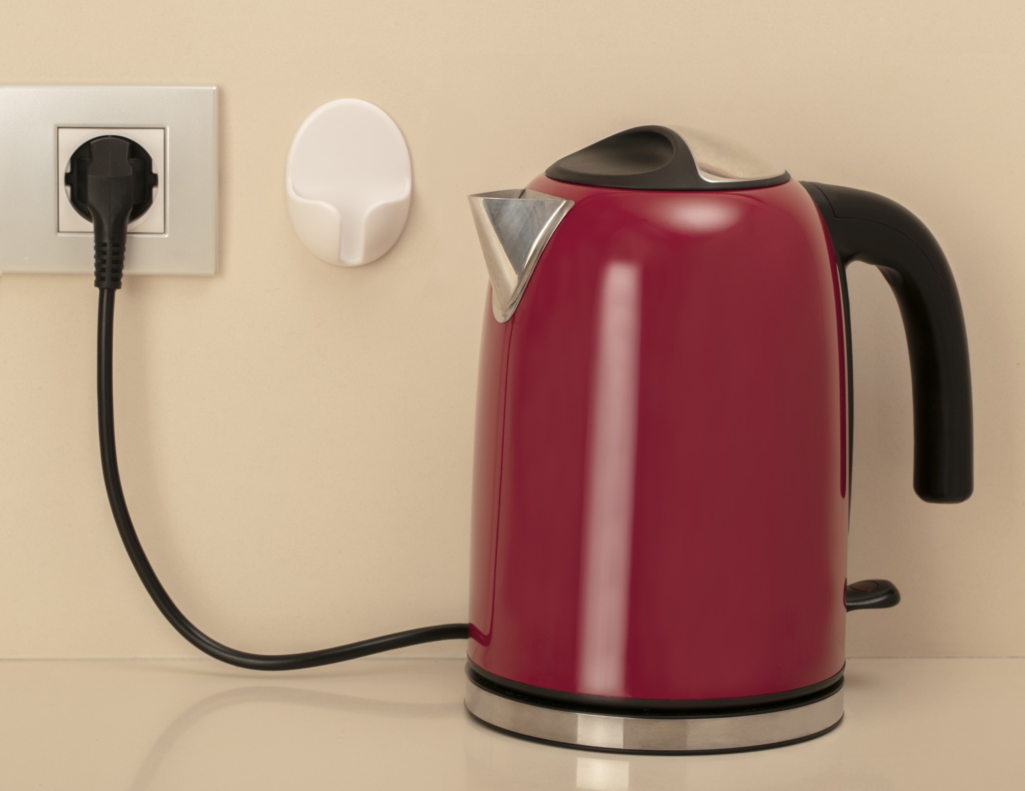 Soporte adhesivo para enchufe / blanco