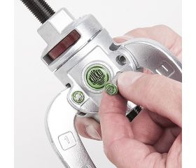 Extractor combinado de 3 brazos con mecanismo de bloqueo