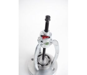 Extractor combinado de 3 brazos con mecanismo de bloqueo