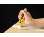 Cúter de seguridad con cortador de precinto con retracción de cuchilla semi automática SK-9