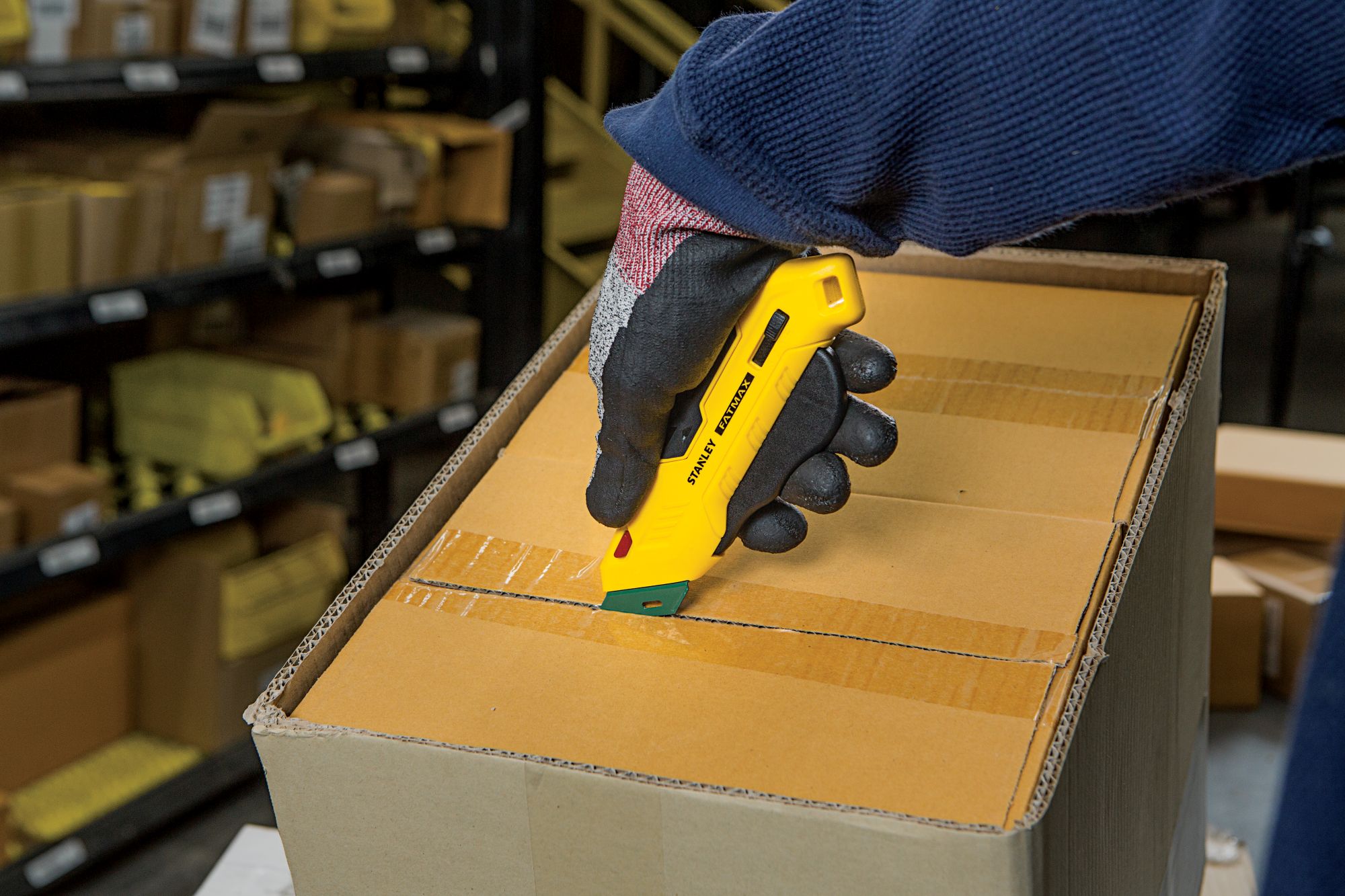 Cuchillo con gatillo para apertura cajas -  para diestros