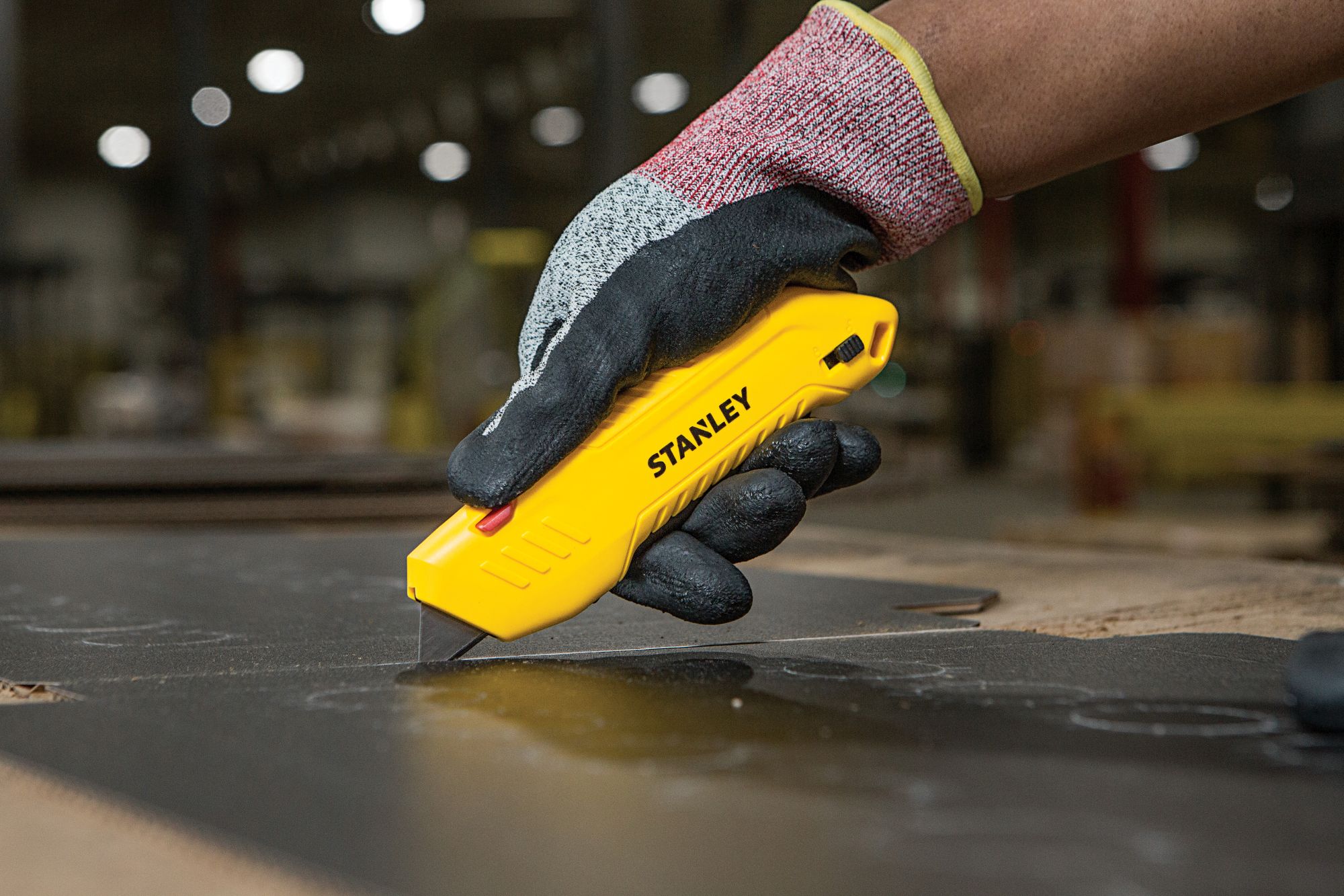 Cuchillo de seguridad con gatillo