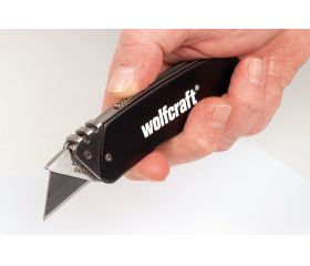 Navaja para ocio con hoja trapezoidal retráctil