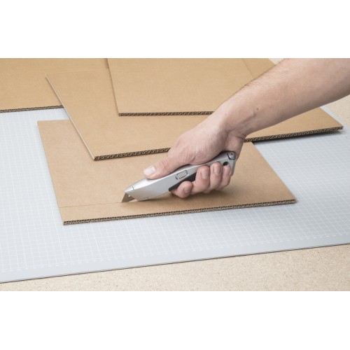 Cúter de cuchillas trapezoidales con cuchilla retráctil