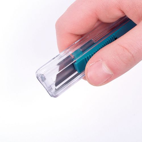 Cúter de seguridad de plástico con cuchilla trapezoidal